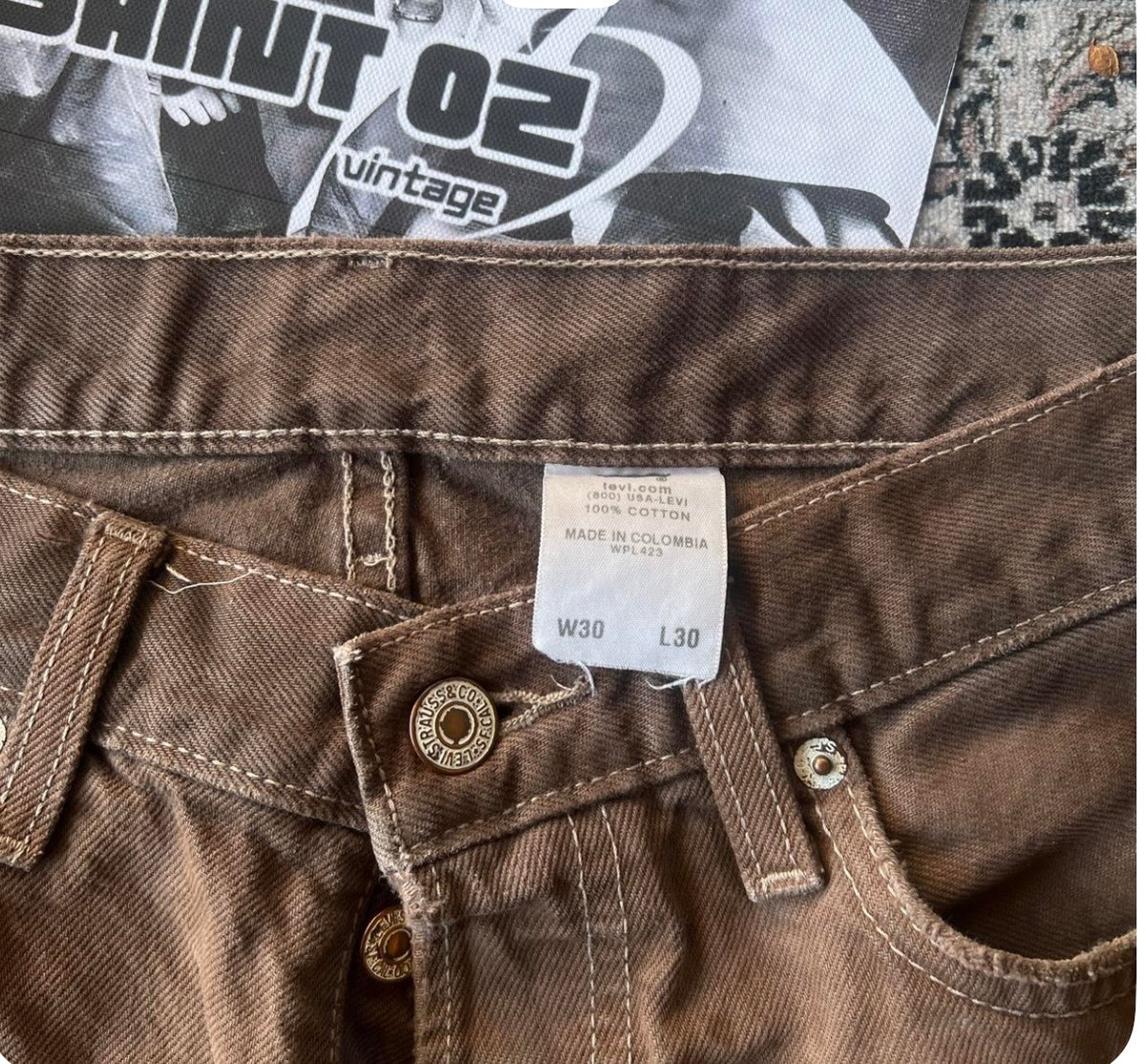 Vintage distressed Levi's brown 301 jeans