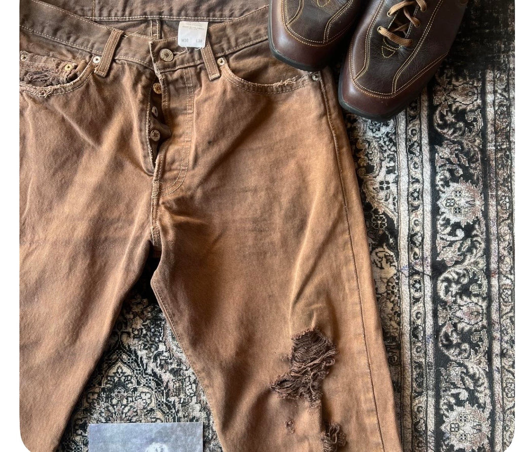 Vintage distressed Levi's brown 301 jeans