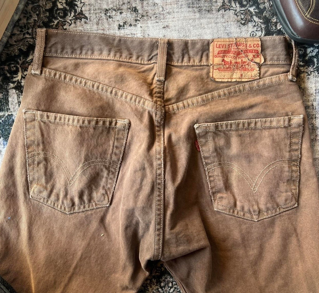 Vintage distressed Levi's brown 301 jeans