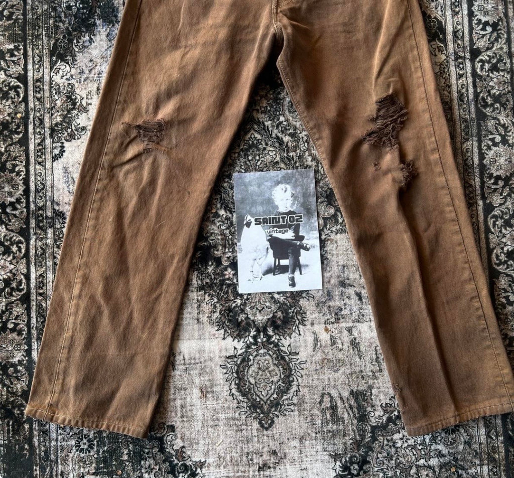 Vintage distressed Levi's brown 301 jeans