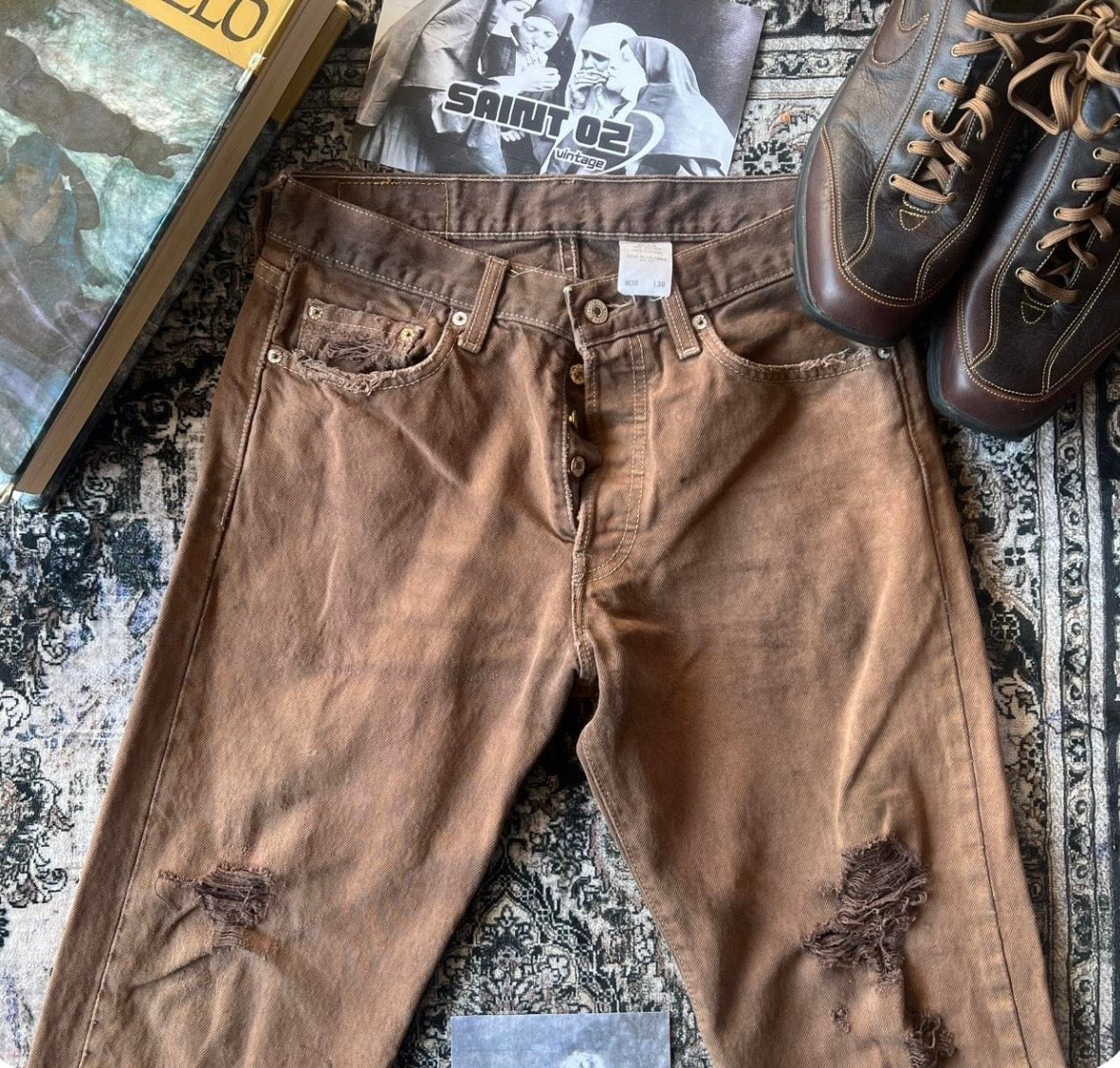 Vintage distressed Levi's brown 301 jeans