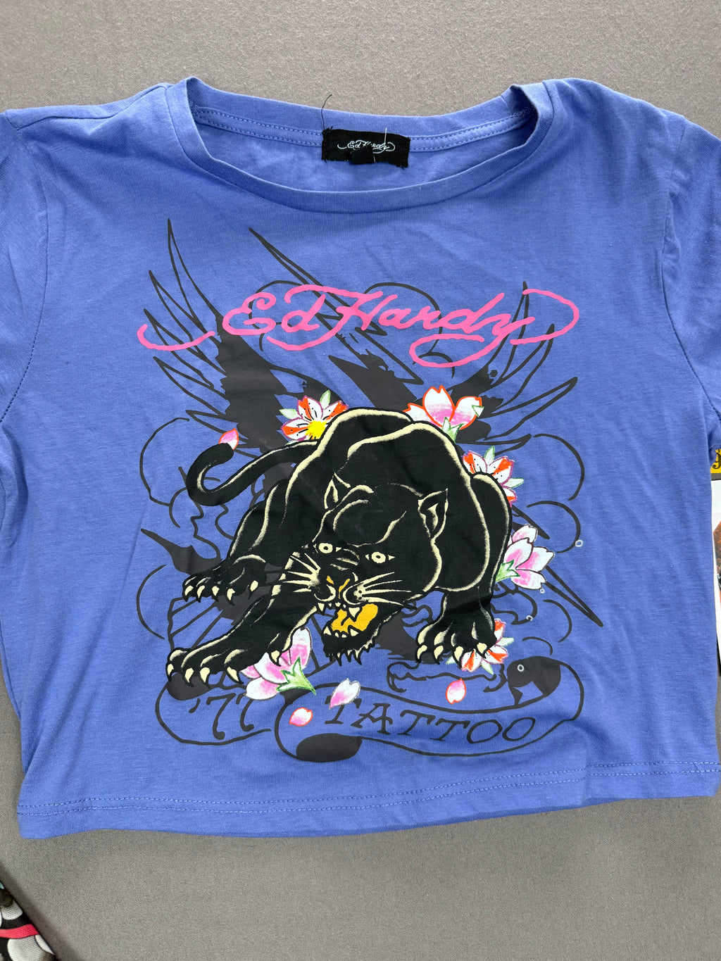 Ed Hardy – Women’s Layered Tattoo-Sleeve Graphic T-Shirt – Style #: EHW1415-6 – Size: Medium – Color: Purple / Blue / Multicolor