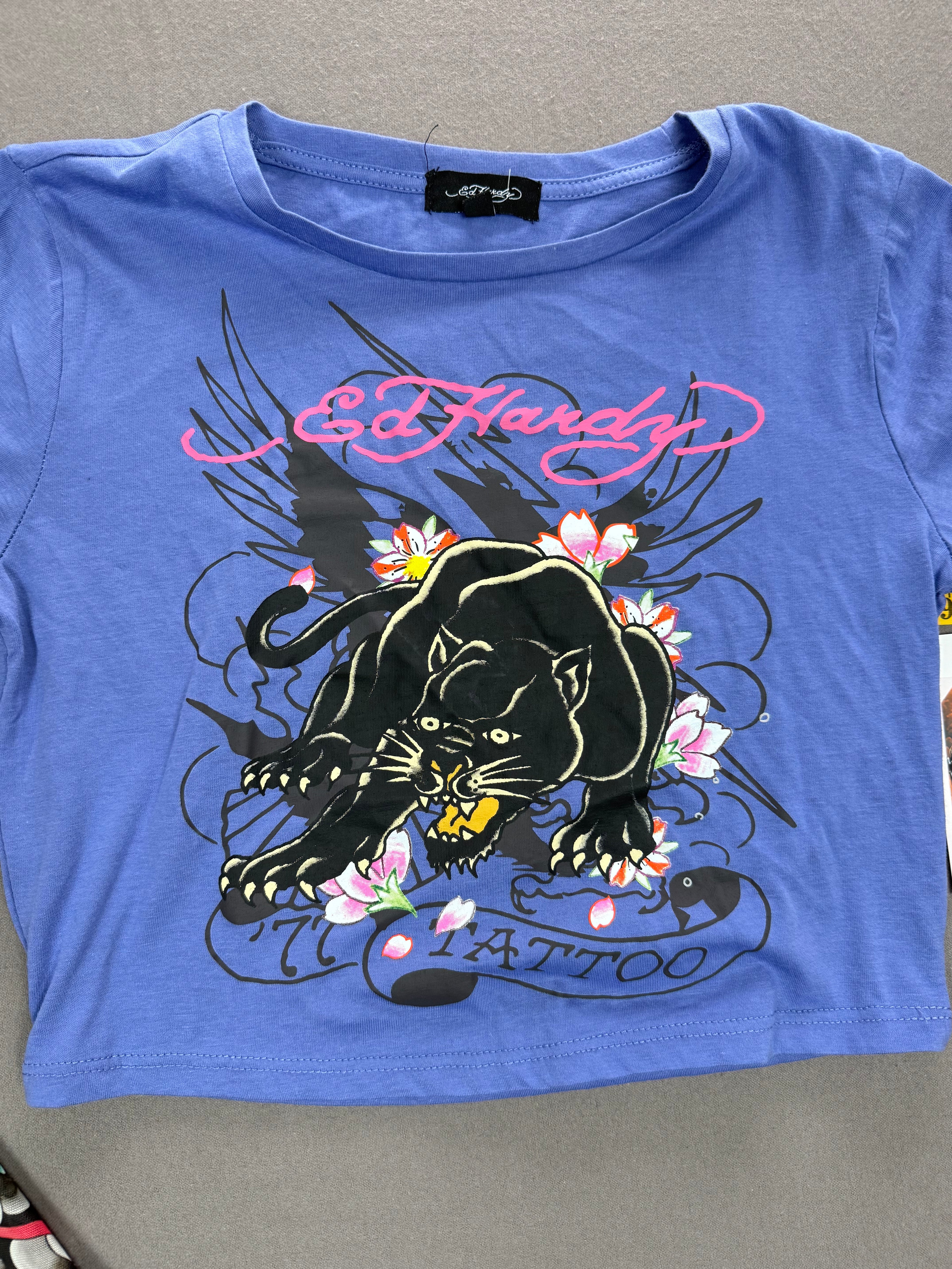 Ed Hardy – Women’s Layered Tattoo-Sleeve Graphic T-Shirt – Style #: EHW1415-6 – Size: Medium – Color: Purple / Blue / Multicolor