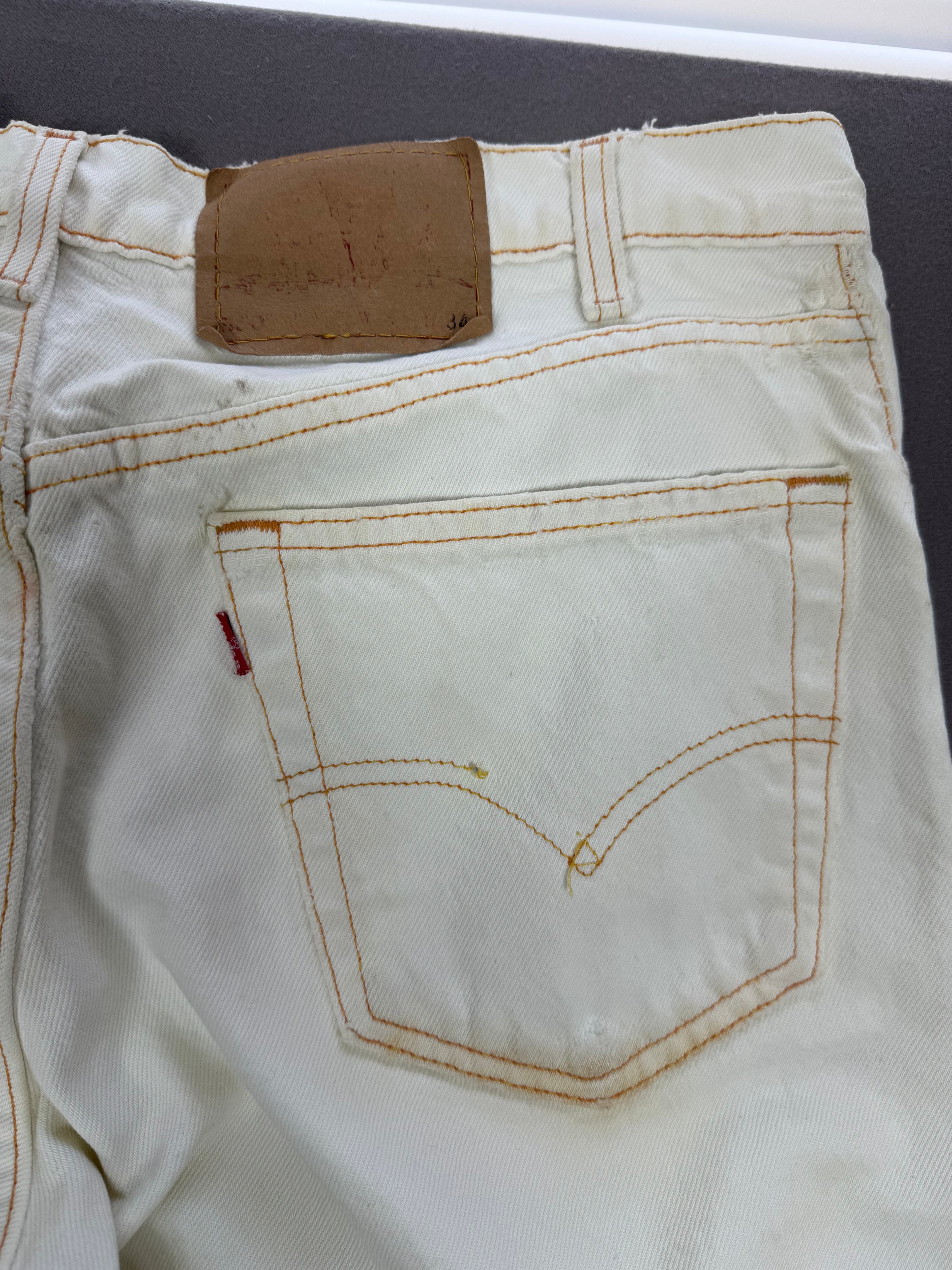 Vintage Levi’s 550 Antique White Jeans with Faded Neon Lime Hem