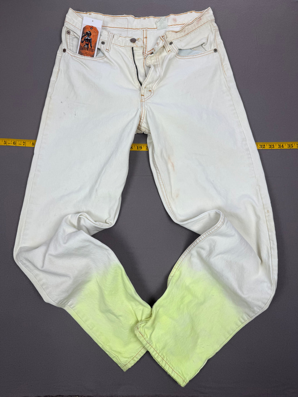 Vintage Levi’s 550 Antique White Jeans with Faded Neon Lime Hem