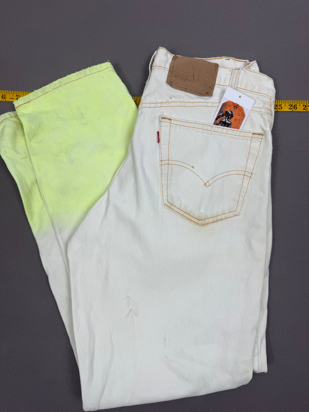 Vintage Levi’s 550 Antique White Jeans with Faded Neon Lime Hem